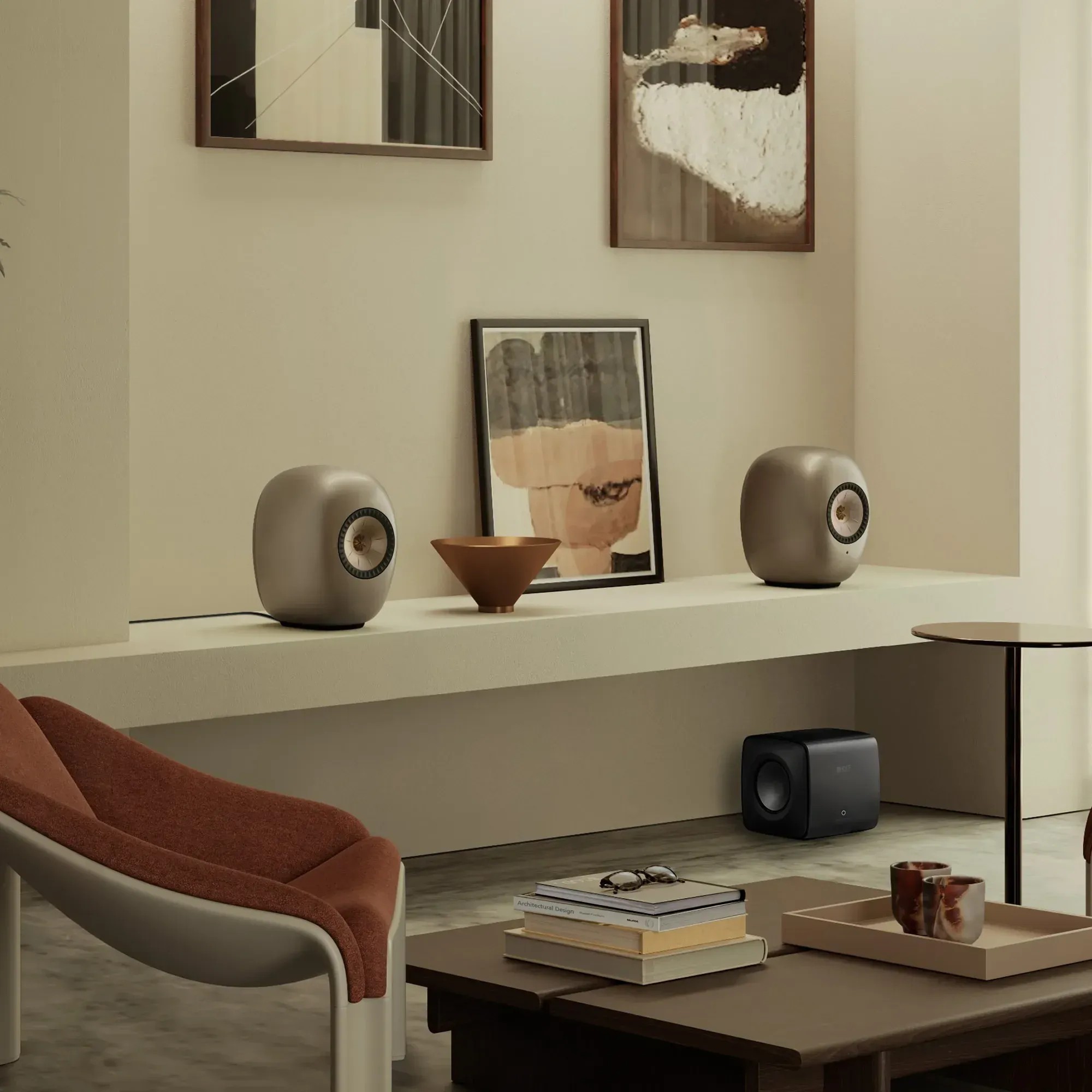 KEF LS Luxe — vista frontale in finitura Eclipse Black, cabinet organico senza spigoli Ross Lovegrove